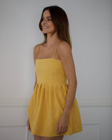 The  Peplum Dress Butter