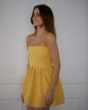 The  Peplum Dress Butter